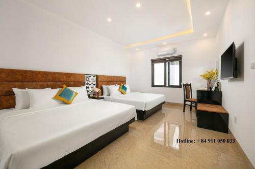 Cama o camas de una habitación en Tuan Chau Kingly Villa