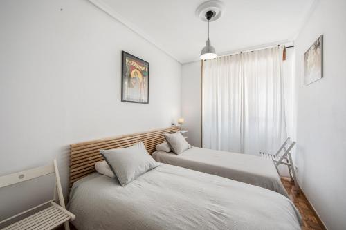 Ліжко або ліжка в номері Magnifico apartamento en el centro de Oviedo
