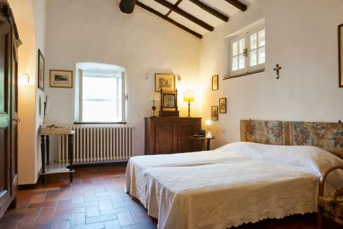 เตียงในห้องที่ Il Cannetro