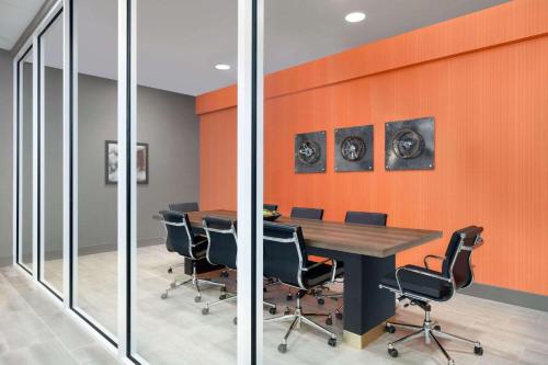 an office with a conference room with a table and chairs at La Quinta Inn & Suites by Wyndham Braselton in Braselton
