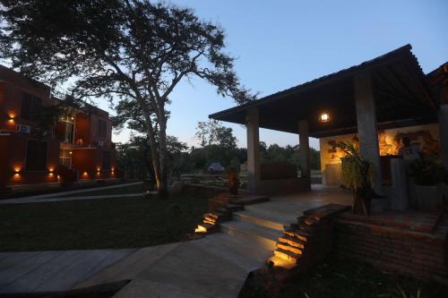 a house with a patio with lights on it at Monaara Leisure - Anuradhapura in Anuradhapura