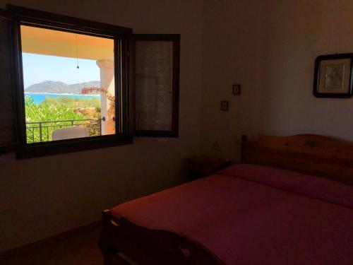 Ένα ή περισσότερα κρεβάτια σε δωμάτιο στο Villa Grazia