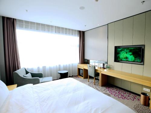TV a/nebo společenská místnost v ubytování Lavande Hotel Yanjiao Hanwang Road Branch