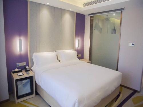 Cama ou camas em um quarto em Lavande Hotel (Hohhot South 2nd Ring Evergrande Huafu Branch)