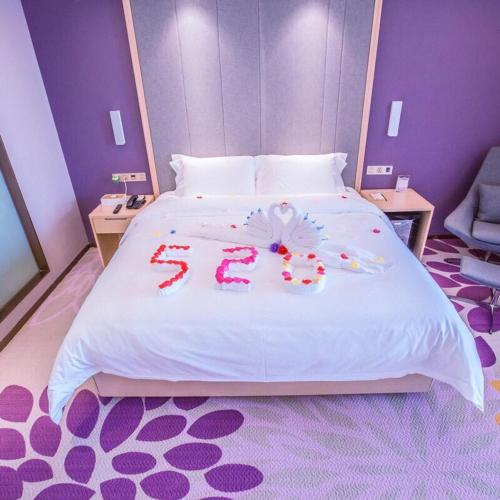 Katil atau katil-katil dalam bilik di Lavande Hotel (Gaozhou Xiantai Bridge Branch)