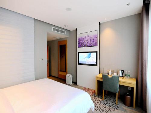 Postel nebo postele na pokoji v ubytování Lavande Hotel Yanjiao Hanwang Road Branch