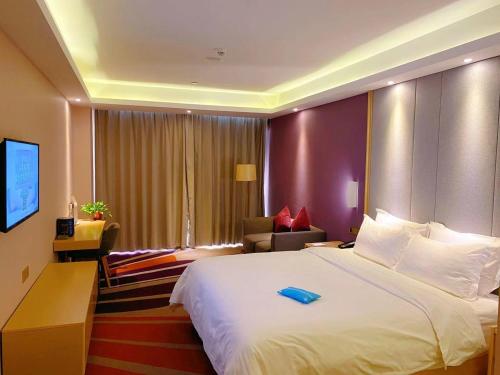 Ένα ή περισσότερα κρεβάτια σε δωμάτιο στο Lavande Hotel (Changsha Railway Station Chaoyang Metro Station Branch)