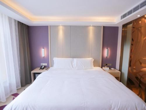 Katil atau katil-katil dalam bilik di Lavande Hotel (Gaozhou Chengdong Bus Station Branch)