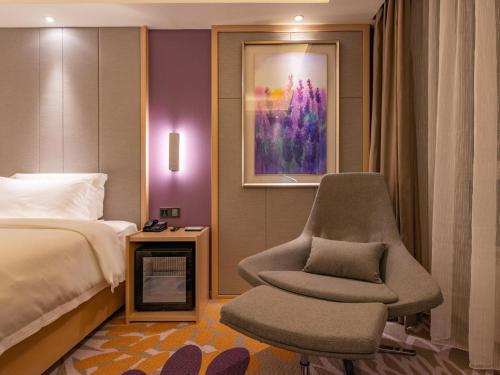 Katil atau katil-katil dalam bilik di Lavande Hotel Heze University Road