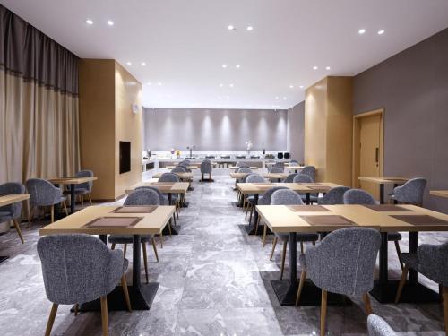 En restaurant eller et andet spisested på Lavande Hotel (Harbin Ice and Snow World University of Commerce Branch)
