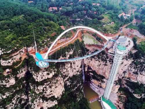 an aerial view of a roller coaster on a mountain at Lavande Hotel (Zibo Beijing Road Huaqiao Building Branch) in Zibo