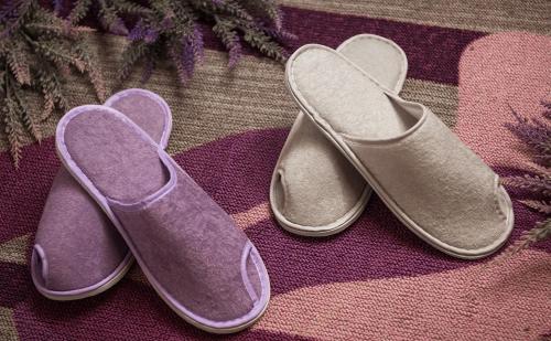 a pair of shoes sitting on a rug at Lavande Hotel Ningbo Railway Station Branch in Ningbo