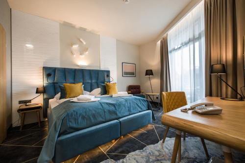 Postel nebo postele na pokoji v ubytování Hotel Zalewski