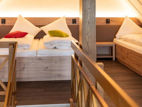 Postel nebo postele na pokoji v ubytování Gasthof Spelsberg