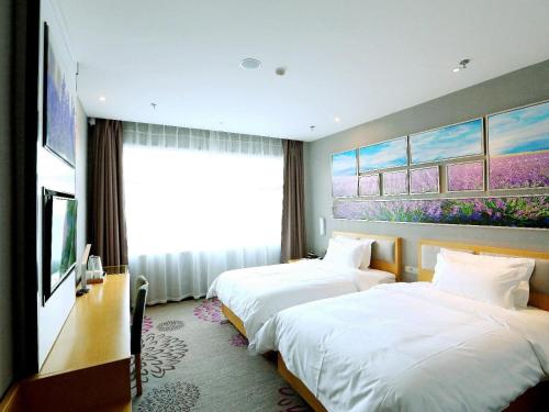 Postel nebo postele na pokoji v ubytování Lavande Hotel Yanjiao Hanwang Road Branch