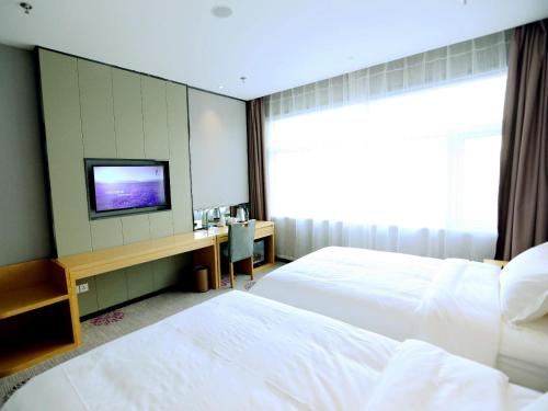 Postel nebo postele na pokoji v ubytování Lavande Hotel Yanjiao Hanwang Road Branch