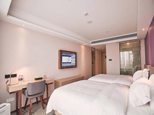 Μια τηλεόραση ή/και κέντρο ψυχαγωγίας στο Lavande Hotel Ningbo Railway Station North Square