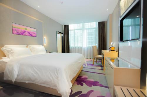 Katil atau katil-katil dalam bilik di Lavande Hotel (Xinyi Fuhai Building Branch)