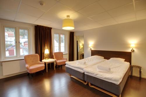 Postel nebo postele na pokoji v ubytování Grännagården Hotell och Restaurang