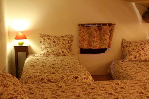 Posteľ alebo postele v izbe v ubytovaní A PAS D ANE