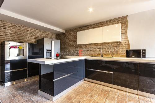 Una cocina o cocineta en Suite 96 - Smart Holiday