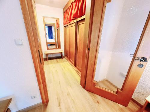 an open door to a hallway in a house at Alpenlandhof in Bad Kleinkirchheim