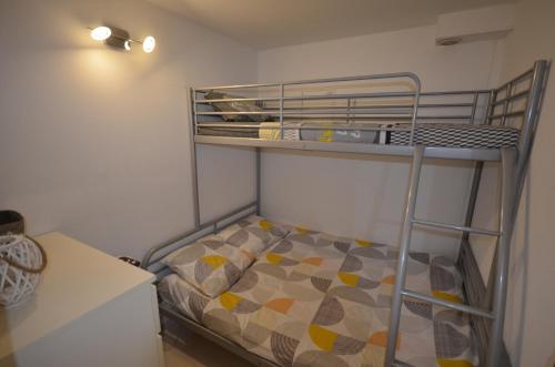 Postel nebo postele na pokoji v ubytování STUDIO VUE PORT ET MER