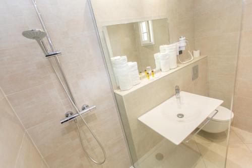 Koupelna v ubytování Hotel Cesario
