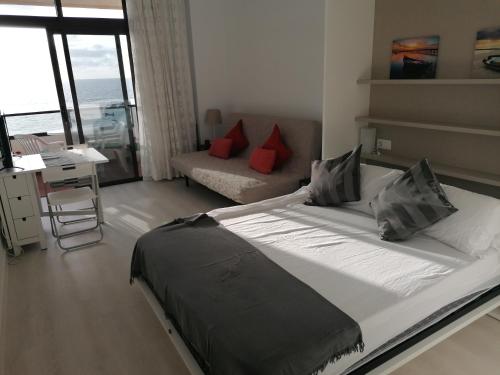 A bed or beds in a room at White Rose