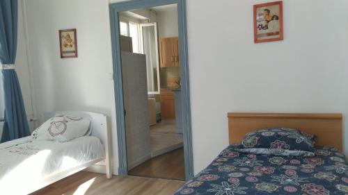 Appartement 2 chambres 52 m2 centre villeにあるベッド