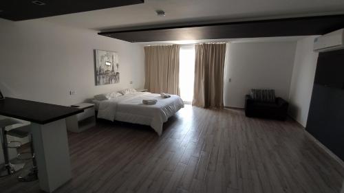 เตียงในห้องที่ Domus Lake Resorts