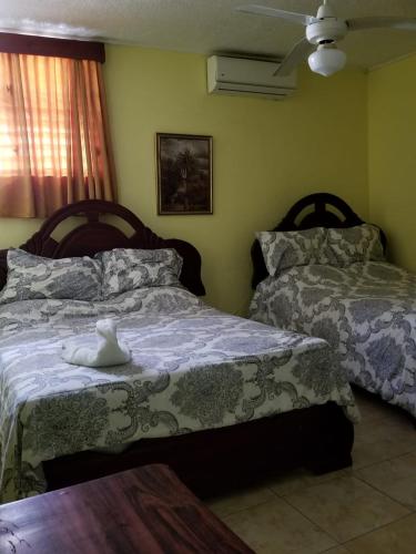 Una cama o camas en una habitación de Hotel Victoriano