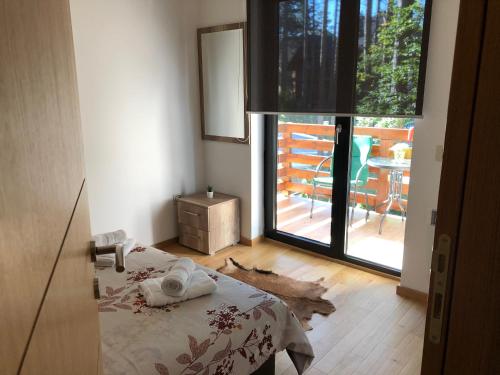 Postel nebo postele na pokoji v ubytování Apartman LUX STELLA