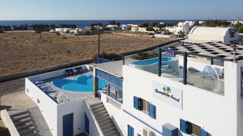 a villa with a view of the ocean at Honeymoon Beach Studios in Perivolos