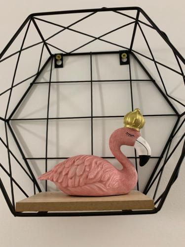 a pink flamingo in a glass box at Sea&Center Lux in Bar