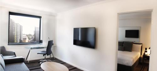 Televiisor ja/või meelelahutuskeskus majutusasutuses Mercure Sydney