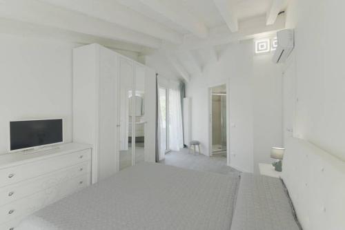 En eller flere senge i et værelse på Villa Joy - Luxury chalet
