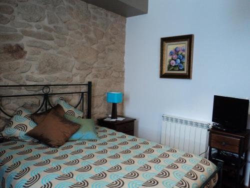 Postel nebo postele na pokoji v ubytování Casa Villar Mayor