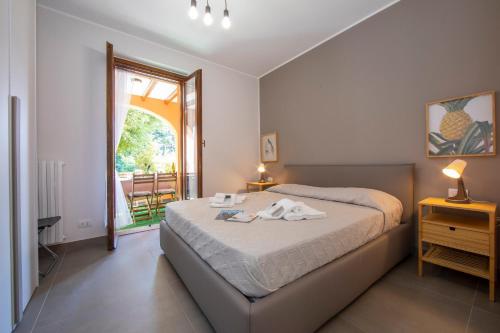 מיטה או מיטות בחדר ב-Menaggio Palphi