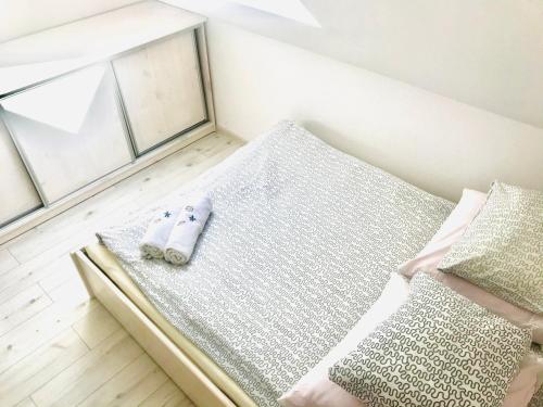 Postel nebo postele na pokoji v ubytování Domki i Apartamenty Całoroczne Koliber