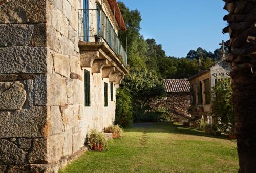 Κήπος έξω από το Casa del Cura de Oliveira