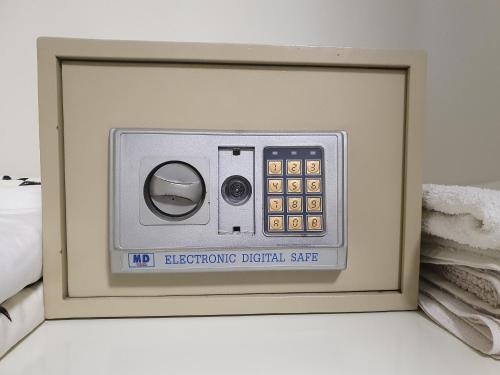a picture of a electronic digital scale in a picture frame at Sea View Deluxe in Bat Yam