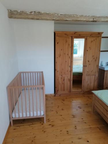Postel nebo postele na pokoji v ubytování Ferienhaus Wastl 91355 Hiltpoltstein,Möchs 11