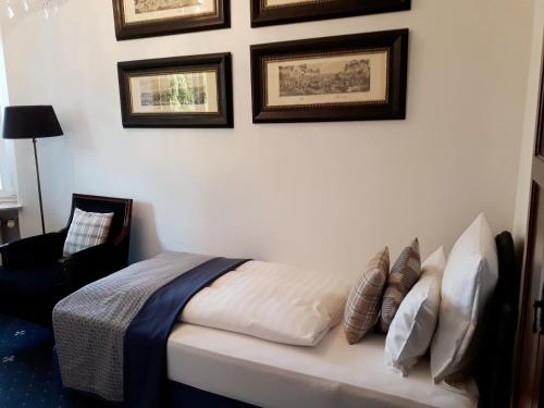 Ένα ή περισσότερα κρεβάτια σε δωμάτιο στο Hotel Windsor