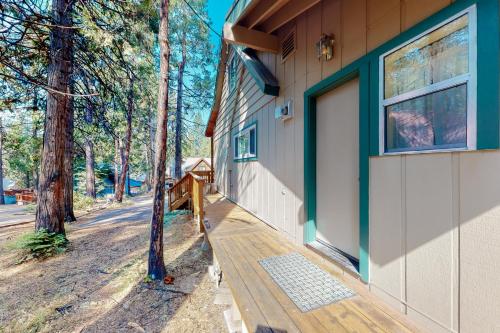 a house with a door on the side of it at Williams Cabin in Shaver Lake
