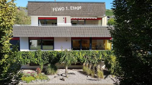 a building with a sign that reads five i edge at Ferienwohnung Wagner in Neumagen-Dhron