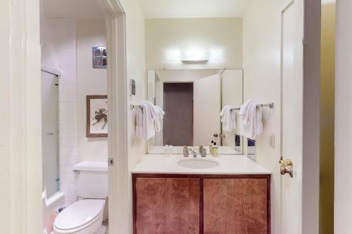 a bathroom with a sink and a toilet at Fireside at the Village in Mammoth Lakes