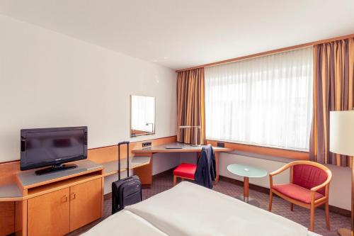 Μια τηλεόραση ή/και κέντρο ψυχαγωγίας στο Mercure Hotel Köln City Friesenstraße