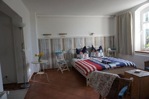 
Ein Bett oder Betten in einem Zimmer der Unterkunft Ostseestuev
