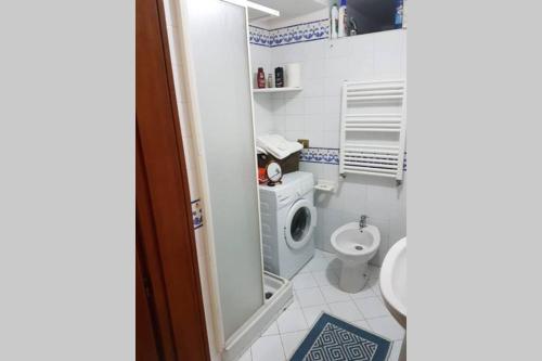 a bathroom with a toilet and a sink at Casa vacanze Sofia in Piano di Sorrento